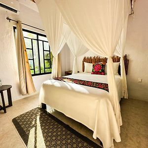 Habitación Estándar con Cama Queen